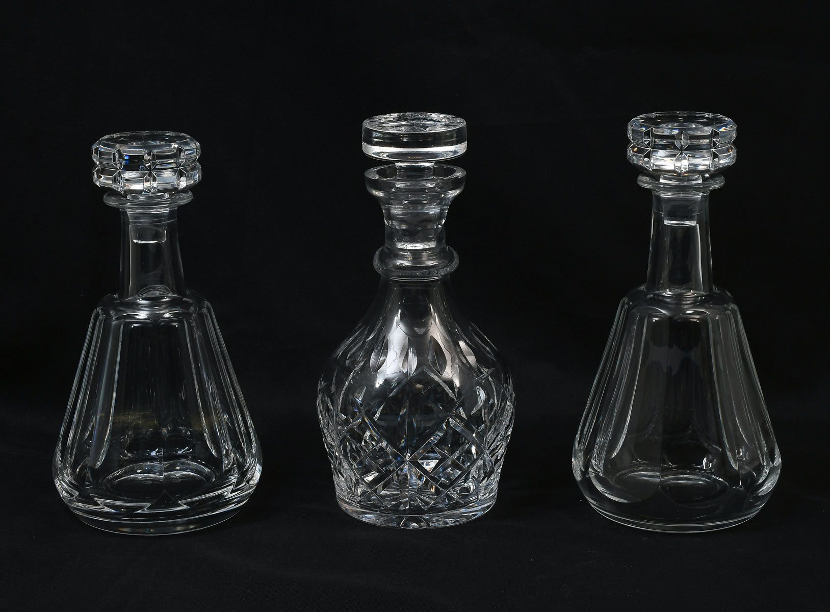 Appraisal: PC BACCARAT WATERFORD DECANTERS Comprising - Paneled Baccarat decanters with