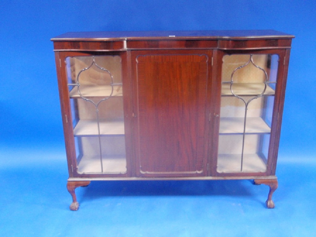 Appraisal: An early thC mahogany display cabinet with moulded and serpentine