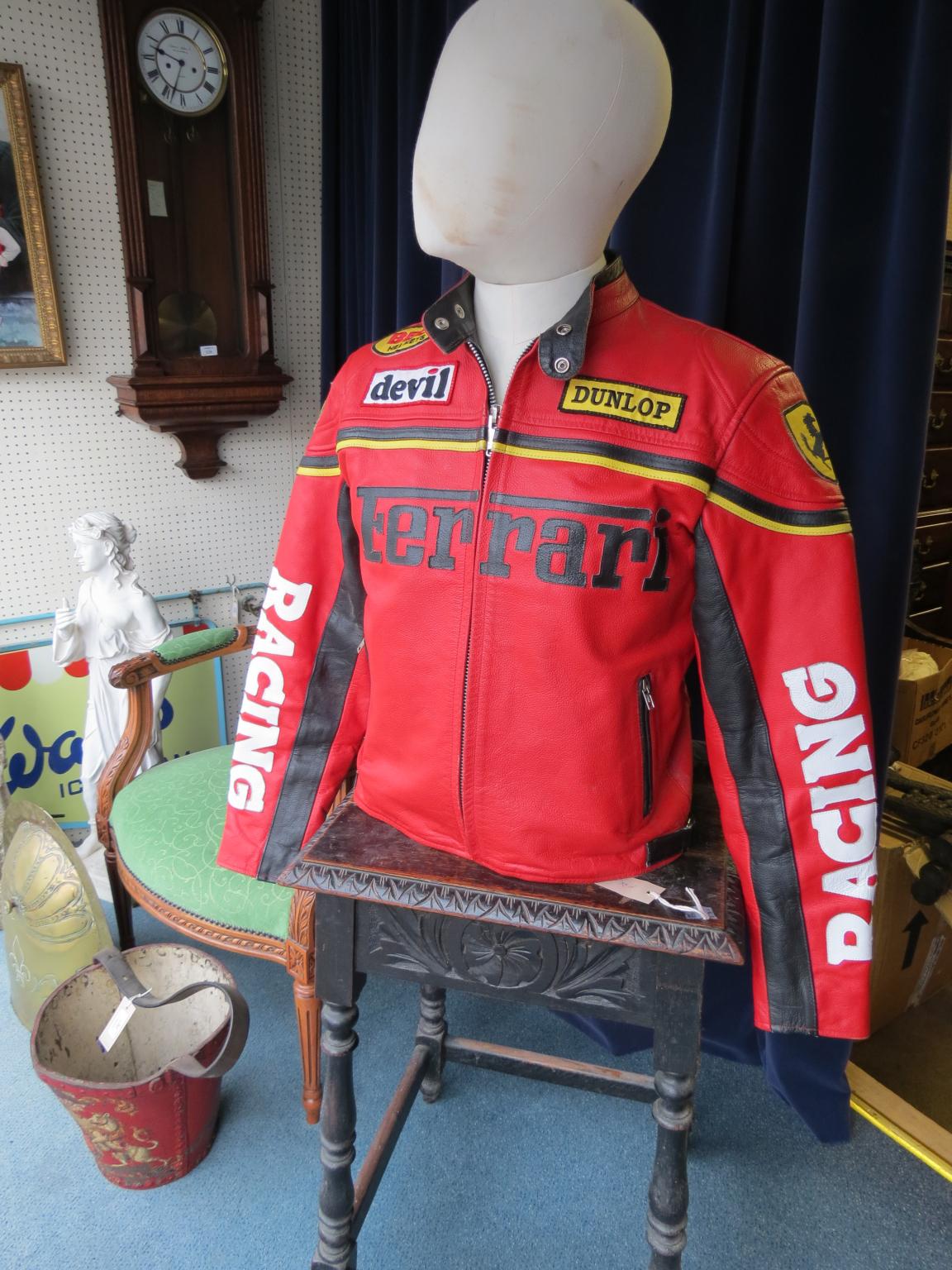 Appraisal: A motor cylcist's red leather Ferrari jacket