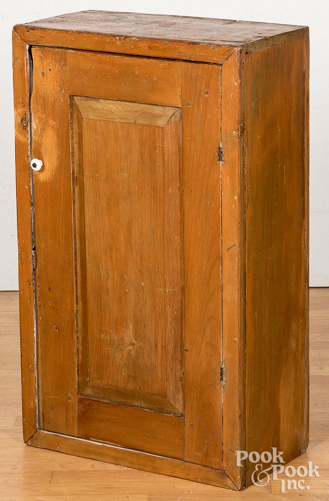 Appraisal: Pine hanging cupboard th c Pine hanging cupboard th c