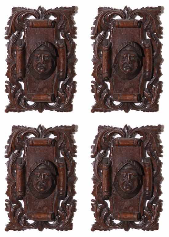 Appraisal: Set of four Continental carved oak wall plaques th century