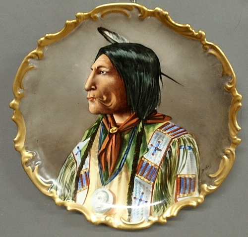 Appraisal: - Round Limoges porcelain plaque with portrait of Indian Wolf