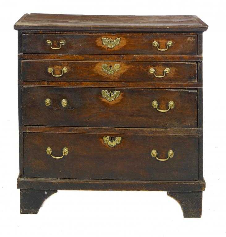 Appraisal: A GEORGE II OAK CHEST OF DRAWERS the moulded top