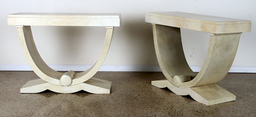 Appraisal: PAIR OF ART DECO STYLE PARCHMENT CONSOLE TABLES A pair