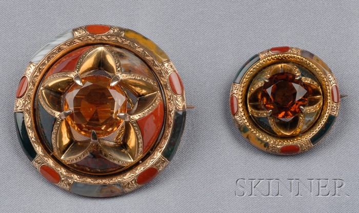 Appraisal: Two Victorian Scottish Agate Brooches one set with a circular-cut