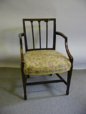 Appraisal: A GEORGE III MAHOGANY ELBOW CHAIR of Sheraton type the