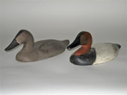 Appraisal: Pair of painted cast iron sink box canvasback decoys probably