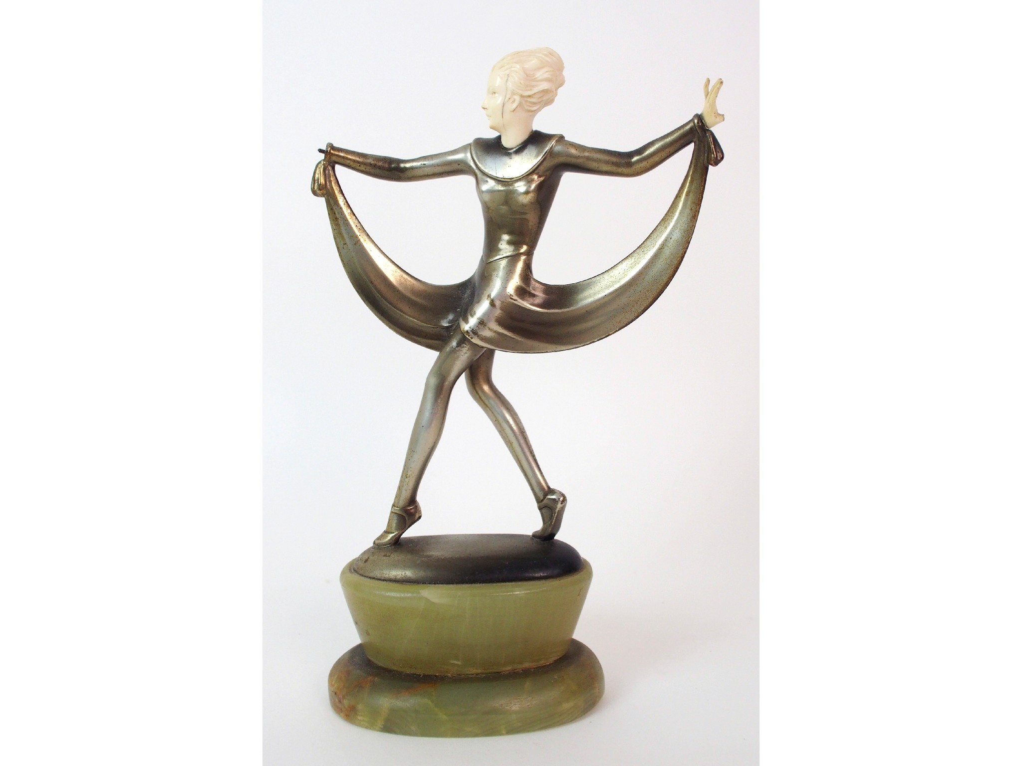 Appraisal: An Austrian Art Deco painted bronze and ivory figure by