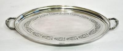 Appraisal: A TRAY of oval form the loop handles moulded with