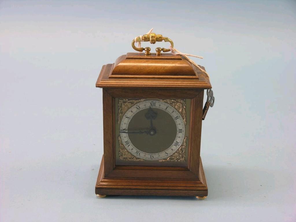 Appraisal: A Georgian-style walnut mantel clock square brass dial with silvered