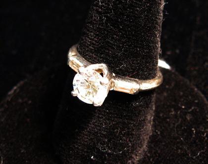 Appraisal: Platinum and diamond engagement ring Round center diamond about carat