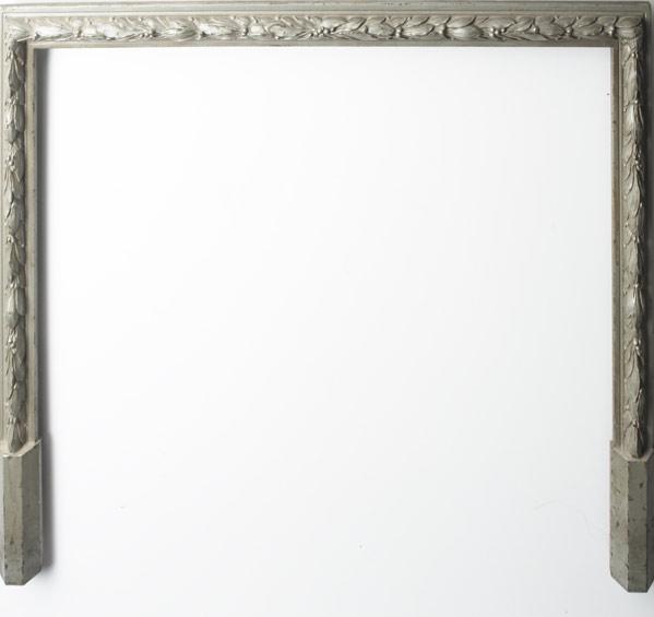 Appraisal: CAST METAL Fireplace surround in gray enamel carved with leaves