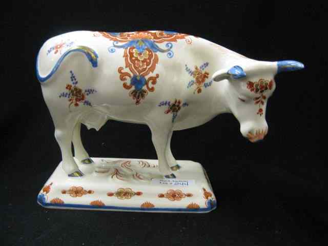 Appraisal: Delft Porcelain Figurine of a Cow fancy red blue gold