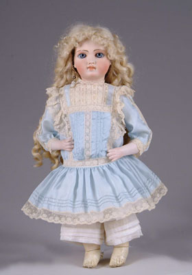 Appraisal: CLOSED-MOUTH GERMAN DOLL Marked with a on the rear of