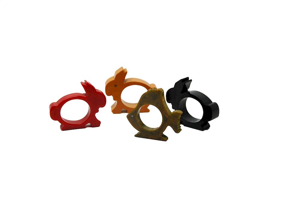 Appraisal: Bakelite Napkin Rings Rabbits And A Fish Bakelite Napkin Rings