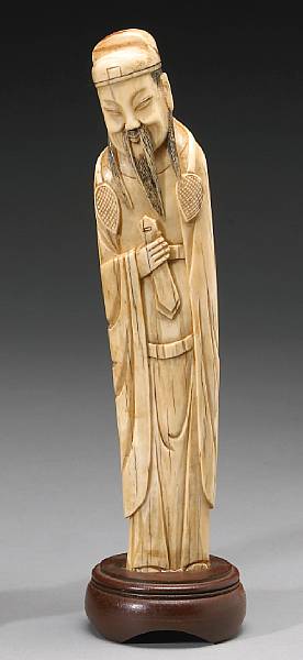 Appraisal: A carved ivory figure of the Daoist immortal Cao Guojiu