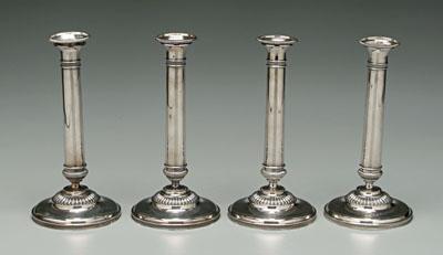 Appraisal: Set four Viennese silver candlesticks round with reeded bands duty