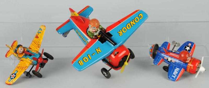 Appraisal: Lot of Tin Litho Airplane Toys Description Japanese Includes one