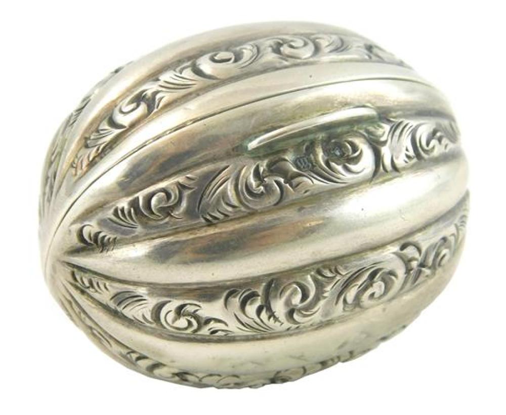 Appraisal: SILVER English sterling nutmeg grater melon form with raised foliate