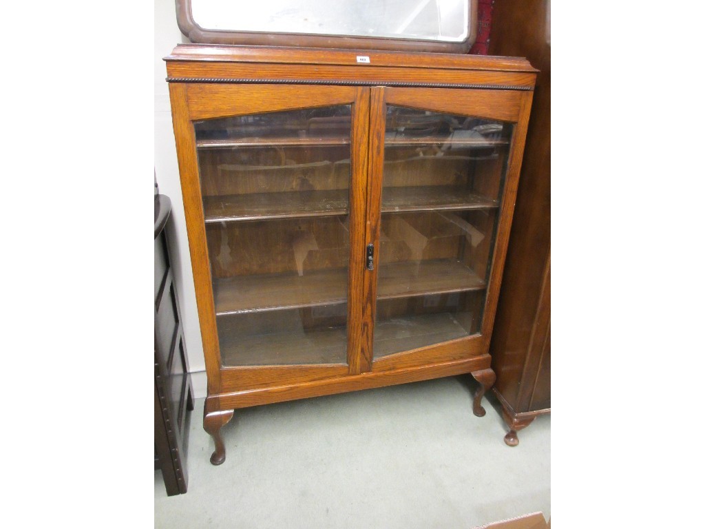 Appraisal: Oak glazed two door bookcase