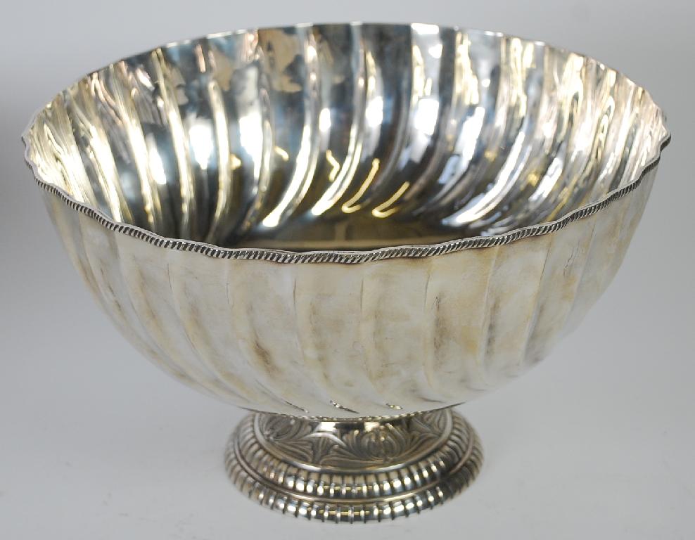 Appraisal: LARGE ELECTROPLATED PUNCH BOWL the spiral fluted bowl on a