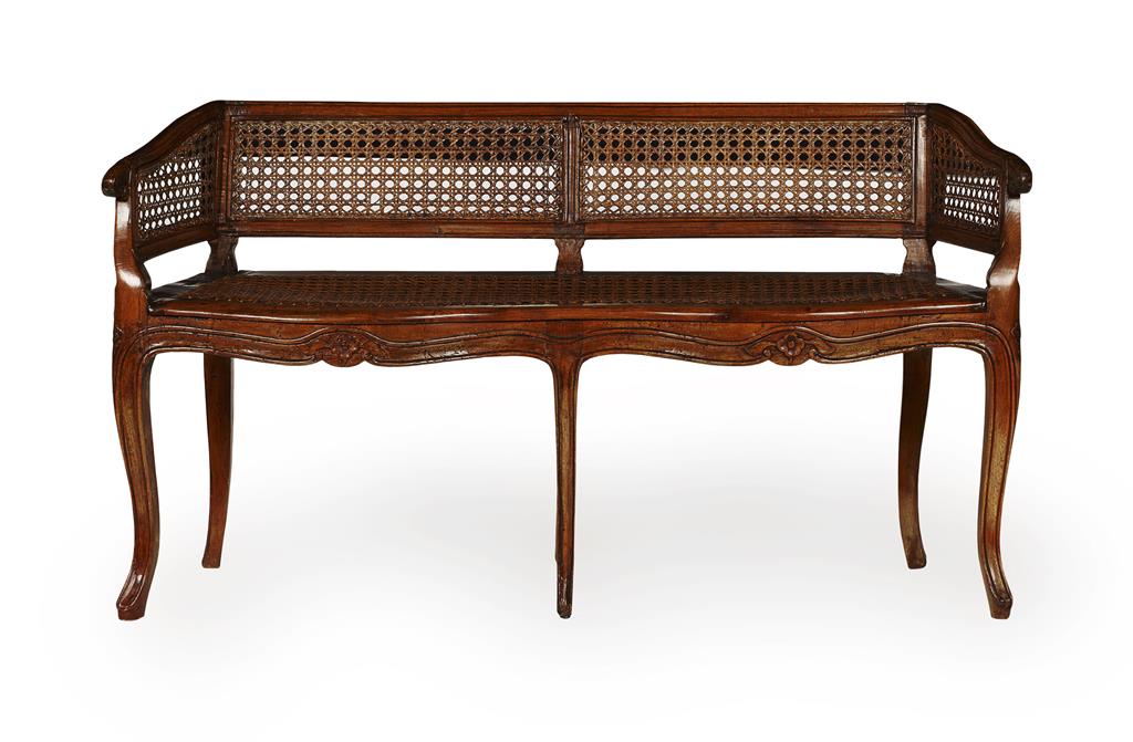 Appraisal: ITALIAN WALNUT AND CANE WINDOW SEAT LATE TH CENTURY the