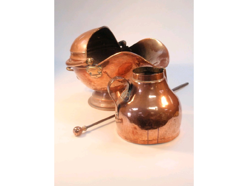 Appraisal: A Victorian copper coal helmet a further jug and poker