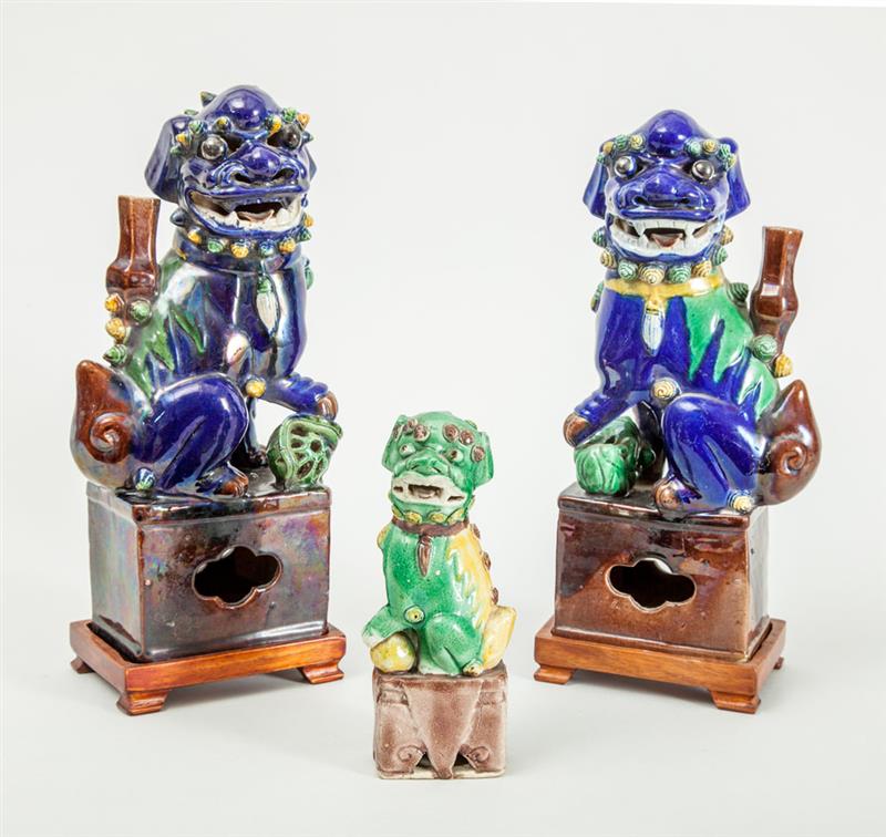 Appraisal: ASSEMBLED PAIR OF CHINESE BLUE-GLAZED FIGURES OF FU DOGS AND