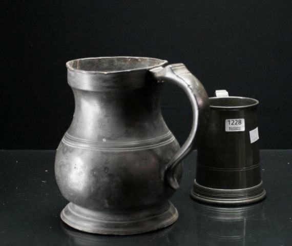 Appraisal: A th century pewter half gallon measuring jug together with