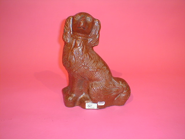 Appraisal: A Derby Nottinghamshire salt glazed stoneware figure of a spaniel