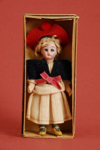 Appraisal: Small German Child in Original Box Germany ca bisque socket