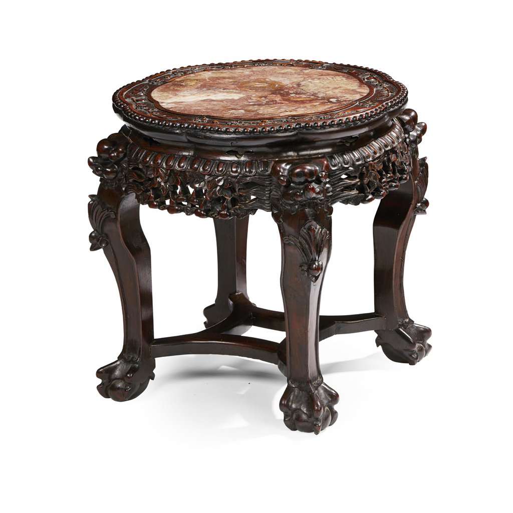 Appraisal: MARBLE-INSET HARDWOOD STOOL the lobed-form top with a mottled marble