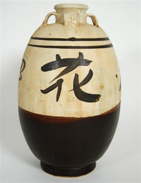 Appraisal: OVOID CHINESE CIZHOU STONEWARE WINE JAR YUAN DYNASTY of ovoid