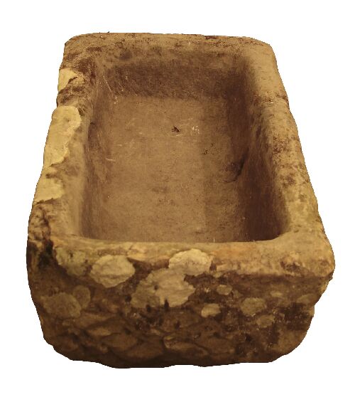 Appraisal: A rectangular stone trough cm long and two circular quern