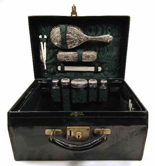 Appraisal: An early th Century Ladies green leather dressing case retailed