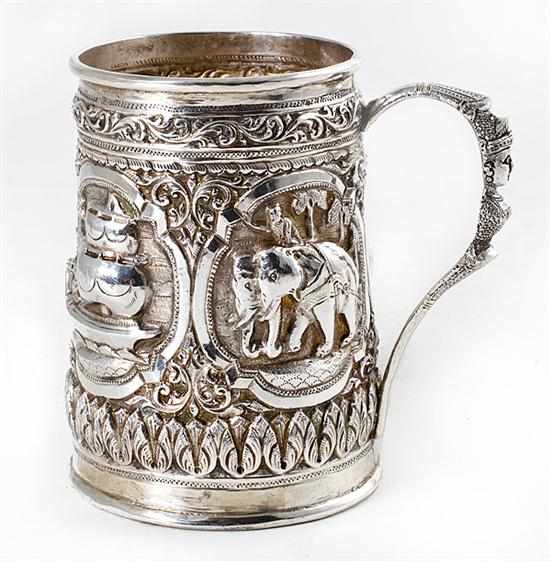 Appraisal: Mideastern silver tankard late th early th century heavily chased