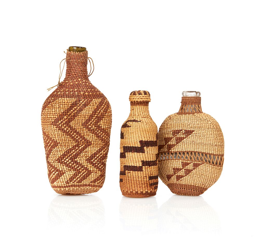 Appraisal: Three Paiute Bottles Three various Paiute woven bottle covers one