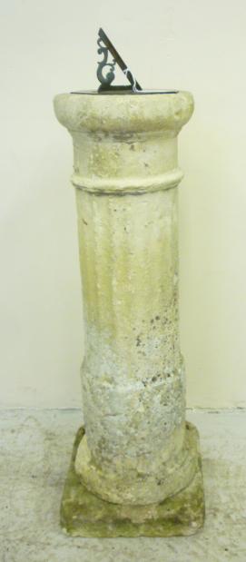 Appraisal: A COMPOSITION STONE SUNDIAL the turned and fluted column surmounted