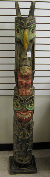 Appraisal: CARVED AND PAINTED WOOD TOTEM POLE featuring four carved totem