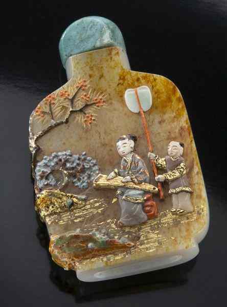 Appraisal: Impressive Chinese Qing carved jade snuff bottle mounted with gilded