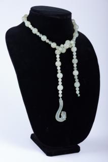 Appraisal: Chalcedony Bead Necklace Of carved beads and horse head hook