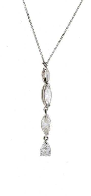 Appraisal: A DIAMOND PENDANT with one pear and two navette shaped