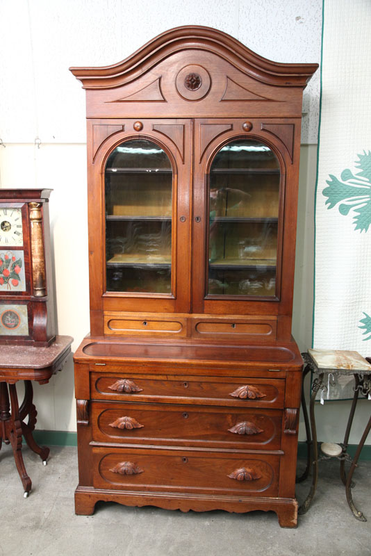 Appraisal: VICTORIAN SECRETARY BOOKCASE Walnut with an arched and molded cornice