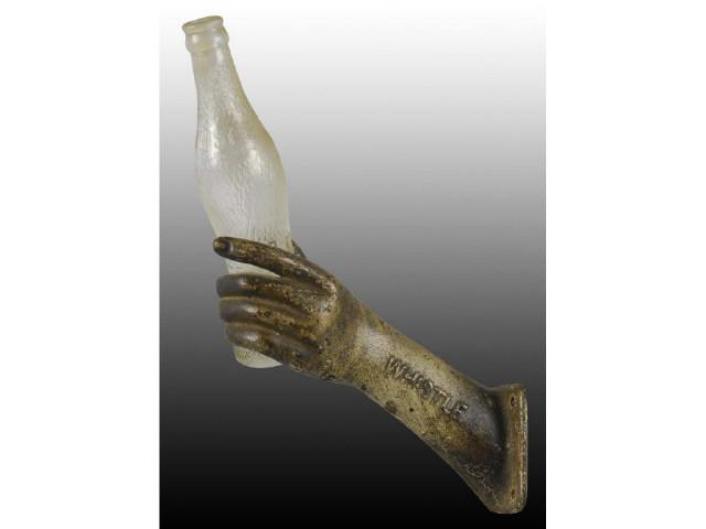 Appraisal: Metal Hand Arm Whistle Bottle Display Description s Includes glass