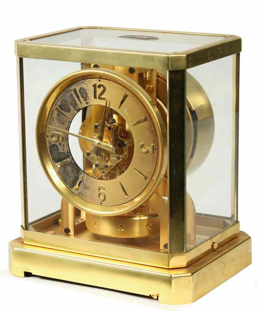 Appraisal: SHELF CLOCK - Fancy LeCoultre Atmos brass and glass shelf