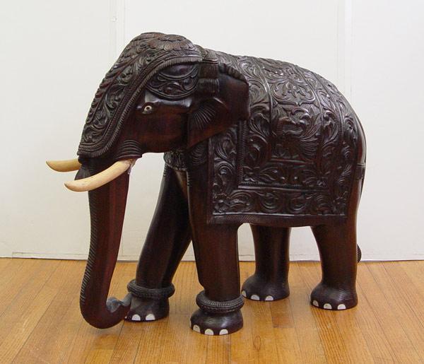 Appraisal: LARGE HEAVILY CARVED ELEPHANT DARK WOOD '' h x ''