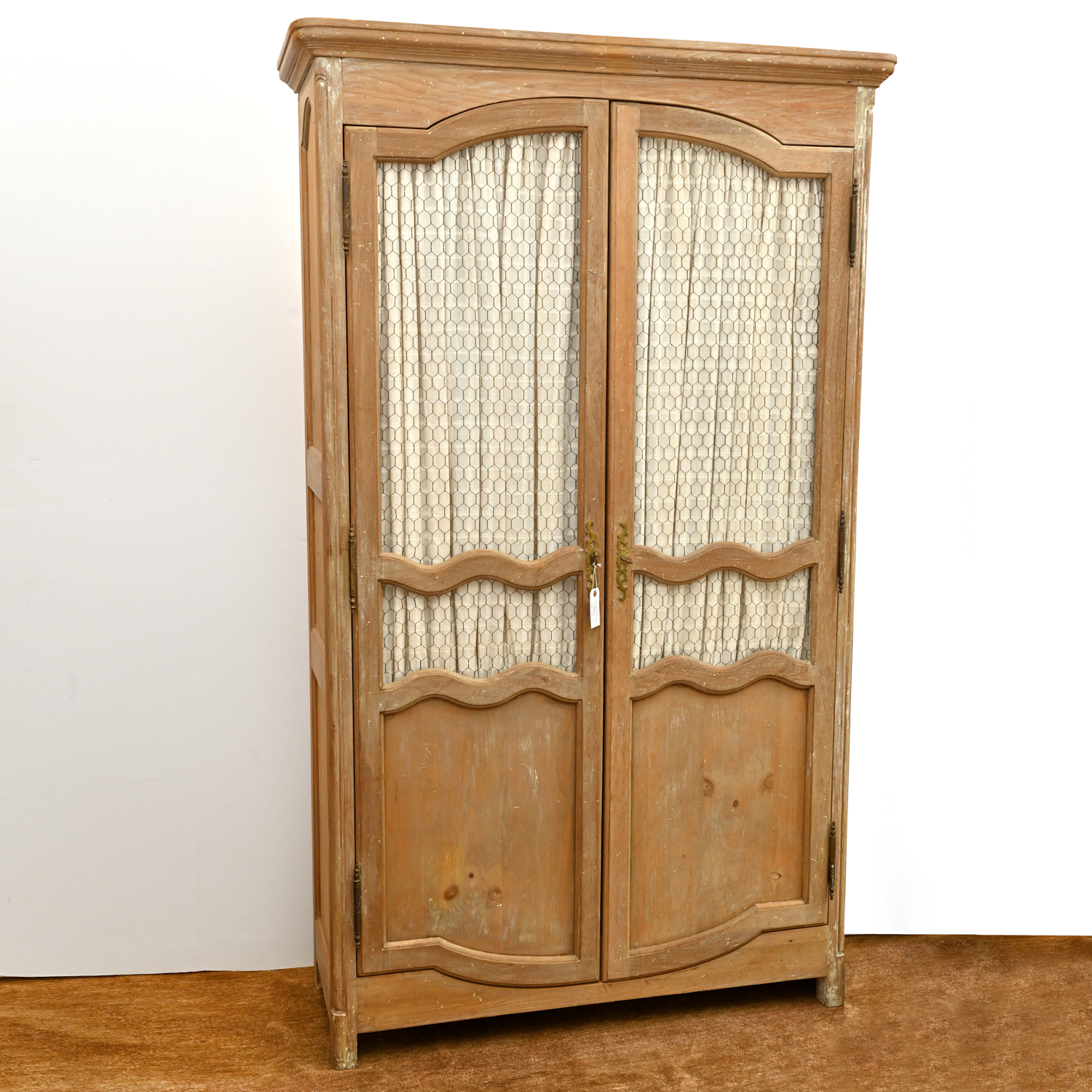 Appraisal: FRENCH PROVINCIAL STYLE BLEACHED PINE ARMOIRE th c curtained chicken