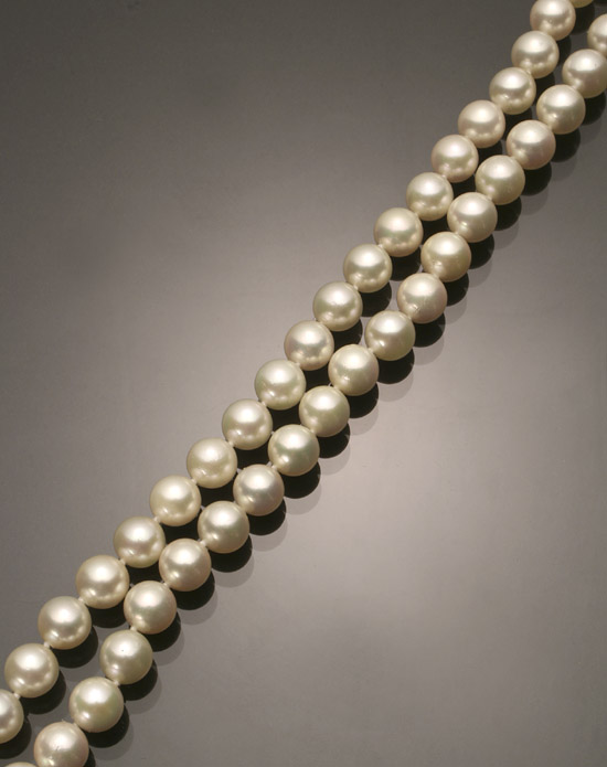 Appraisal: Opera Length Cultured Pearl Necklace Knotted The continuous single strand