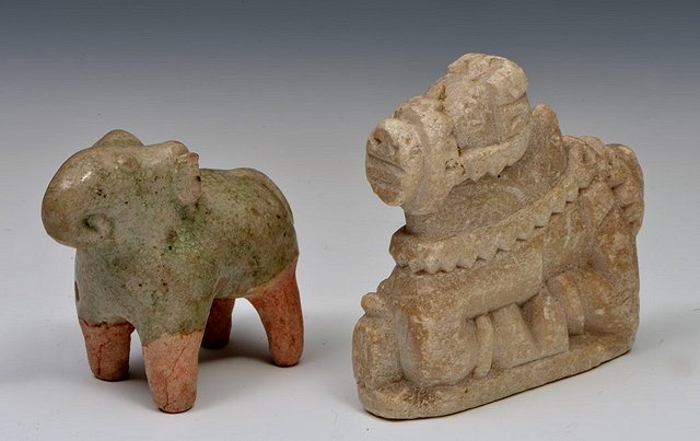 Appraisal: A SMALL CELADON GLAZED ELEPHANT South East Asia th th