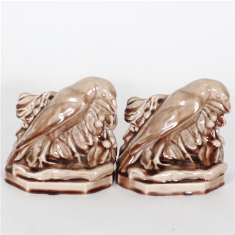 Appraisal: Light brown glazed Rookwood Rook bookends Marked with Rookwood mark